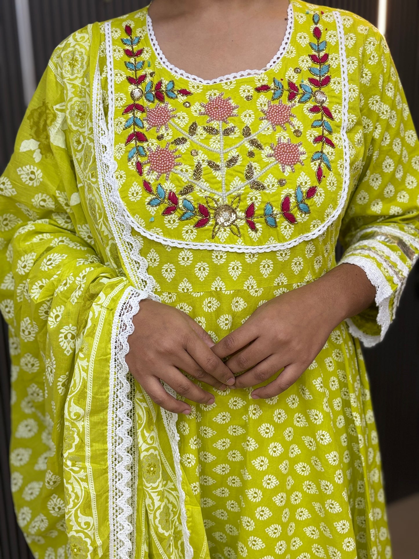 Green yolk embroidered laced anarkali set