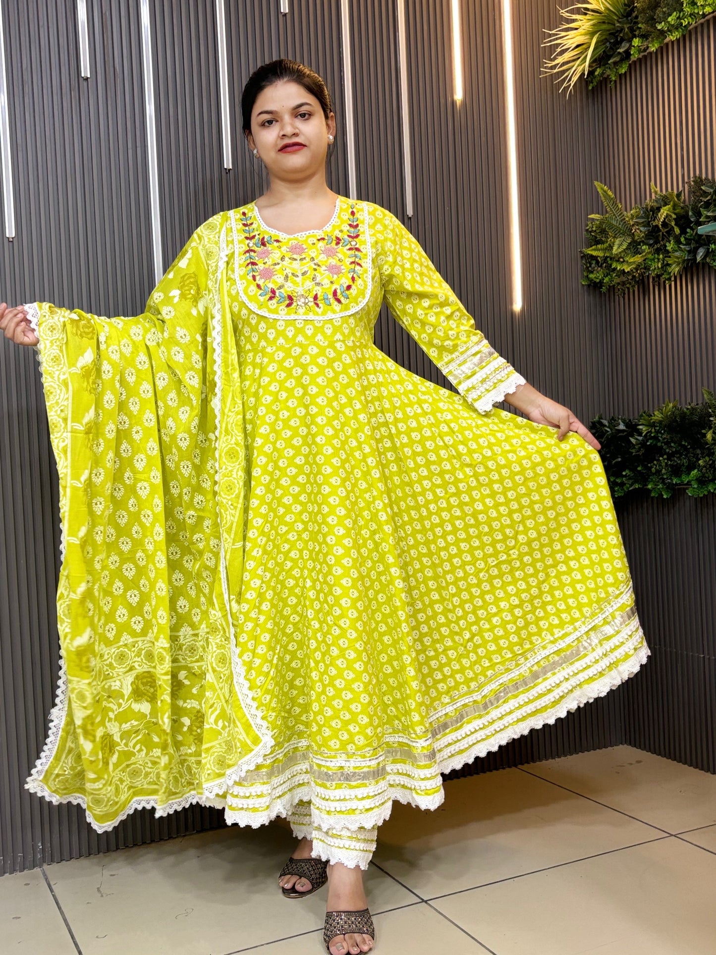 Green yolk embroidered laced anarkali set